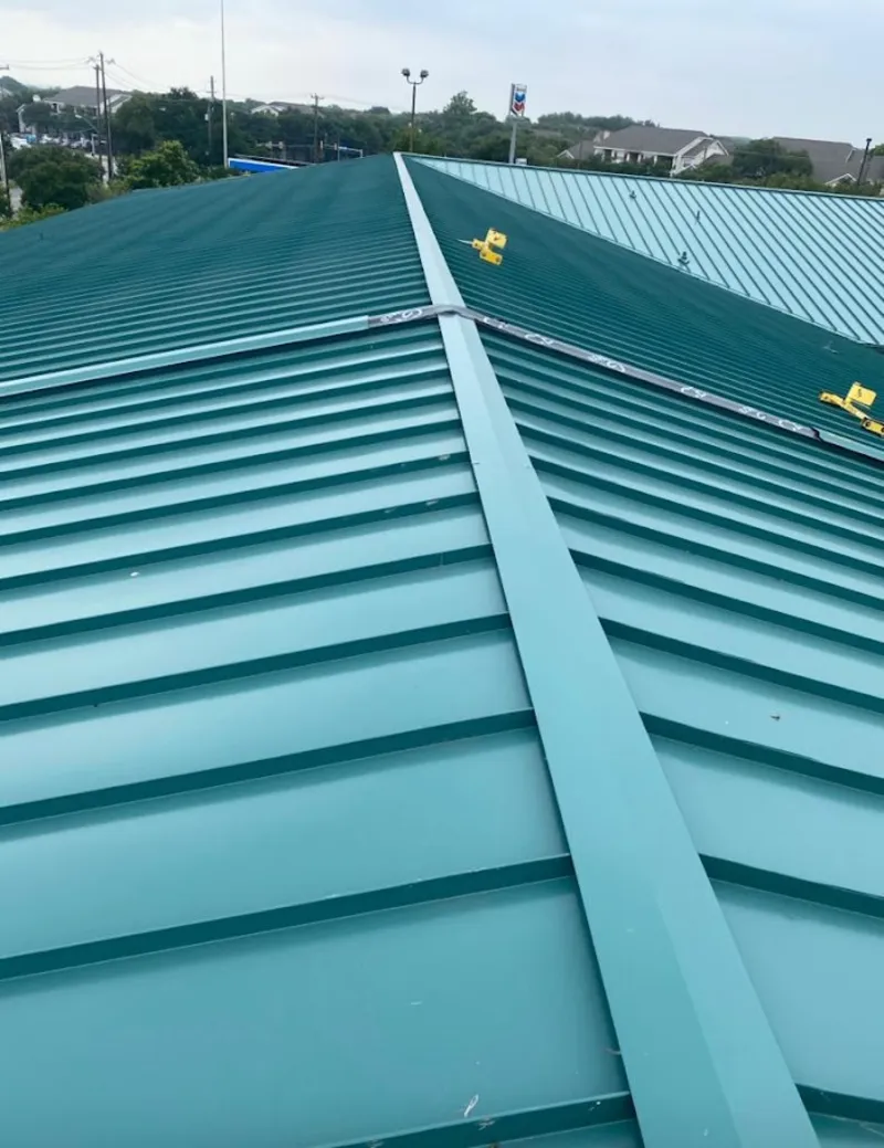 Green commercial metal roof ridge and valley for Metal Roof Repair in Kansas City